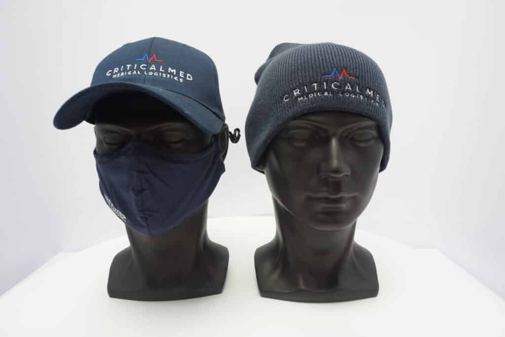 Critical Med staff wearing custom branded uniform ,printed caps and masks by Workwear Toronto